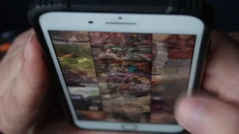 Close-up Of Young Man Hands Typing Sms Scrolling Pictures Phone Video stock 240753296