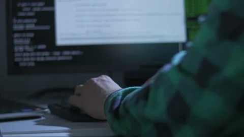 Close up of young man hands using two computers for programming at home Stock Footage 142977284