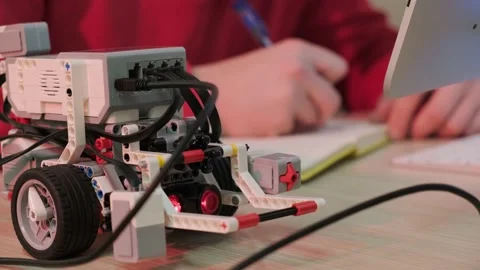 Close up of an young man that is learning robotics lessons using computer. Stock Footage 165294387