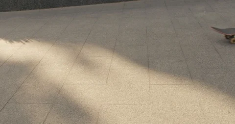 Close up of young man legs performing a trick with his skateboard in slow motion Stock Footage 88534394