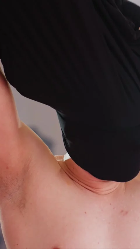 Close up of young man with light brown hair revealing skin details including Stock Footage 343089349