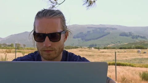 Close Up of Young Man Looking at Laptop Screen Stock Footage 344809236