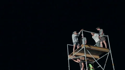 Close-Up of a Young Man Makes Extreme Jump From a Tower on an Air Cushion at Stock Footage 60709801