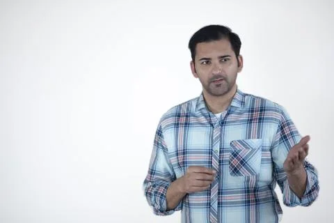 Close-up of a young man presenting and showing text or product - isolated on ... Stock Photos