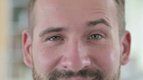 Close Up of Young Man Raising Eyebrows Stock Footage 127595539