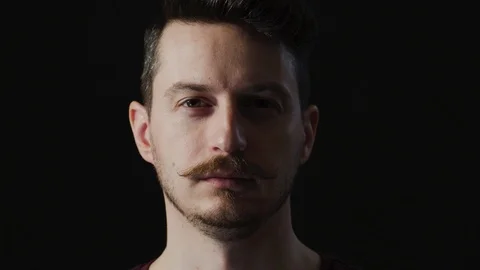 Close up of a young man shouting Stock Footage 99748744