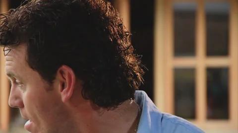 Close Up of young man smiles and flirts to camera Stock Footage 38758345