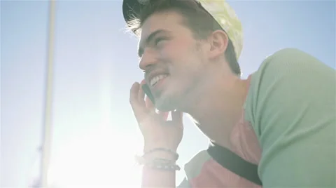 Close up of young man in the street talking on the phone in the city. Stock Footage 43222723