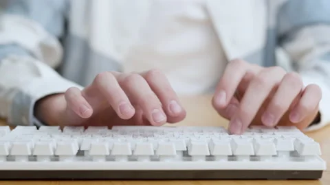 Close-up Young Man Student Working on Computer Typing Keyboard in Home Stock Footage 165430225