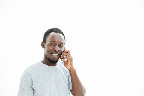 Close up. young man talking on mobile phone. Stock Photos