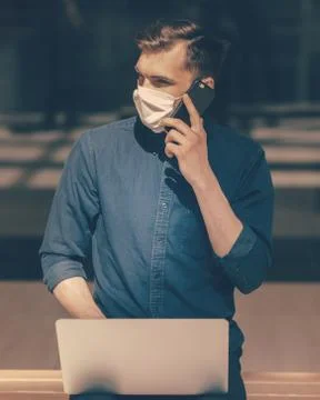 Close up. young man talking on a mobile phone. Stock Photos