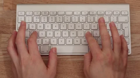 Close-up of a young man typing on a laptop keyboard Stock Footage 48223367