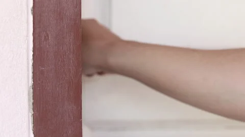 Close up of  young man used the key to unlock the door lock, release the door Stock Footage 143988854