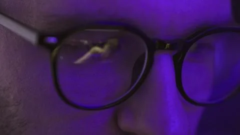 Close up of young man using digital device and watching dj party show Stock Photos