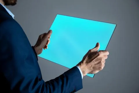 Close-up of a young man using futuristic latest innovative technology Stock Photos