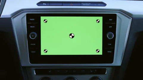 Close-up of young man using navigation app on mounted mock-up greenscreen inside 動画素材 194751681