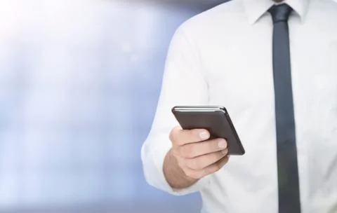 Close up of young man using smart phone with copy space Stock Photos