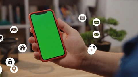 Close up young man using smartphone with green screen white animation сloud Stock Footage 126799398