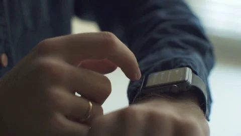 Close up of young man using smartwatch Stock Footage 79139700