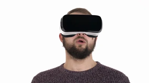 Close-up of a young man in virtual digital glasses turning his head to the Stock Footage 121194704