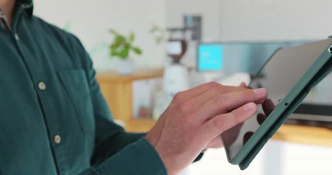 Close up of young man waitress using digital tablet at counter and taking orders Video stock 203892238