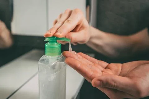 Close up. a young man washes his hands with soap. Stock Photos