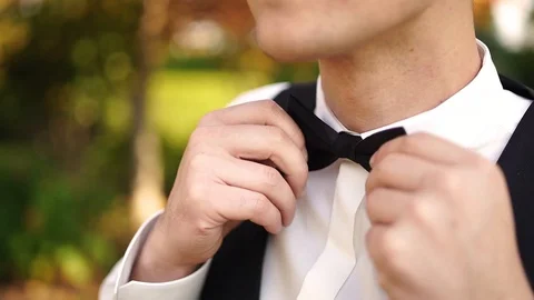 Close up of a Young man wearing a  bow-tie Stock Footage 128651867