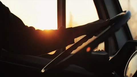 Close-up of a young man's hand on the steering wheel of a car on the background Stock-Footage 144319951