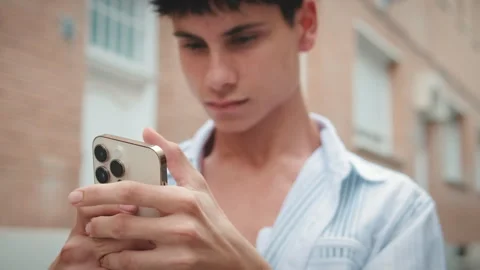 Close-up of young man's hands holding mobile phone Stock Footage 252505002