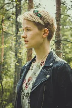 Close up young model in stylish clothes in park portrait picture Stock Photos