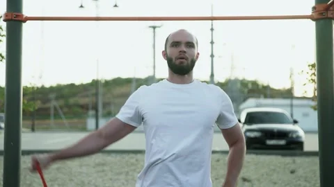 Close up of young muscular man doing exercise to lifting left hand with Stock-Footage 143504584