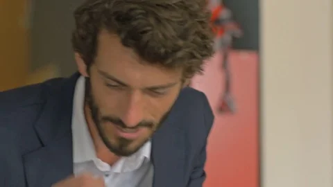 Close-up of young passionate designer discussion in small business office. Stock Footage 80468418
