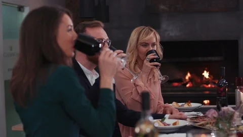 Close up young people have fun in the stylish restaurant drink female friends Stock Footage 104568158
