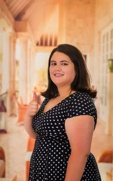 Close up of young plus size model wearing a beautiful dress, xxl woman in Stock Photos