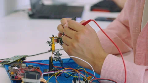Close-Up of Young Professional Hands of Engineer Diagnosing Computer Components Stock Footage 255567252