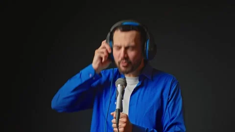 Close up of an young professional smiling energetic caucasian male singer Stock Footage 168620052