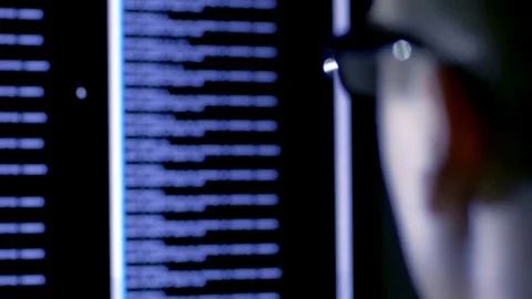 Close-up of young programmer processing new data Video stock 72468315