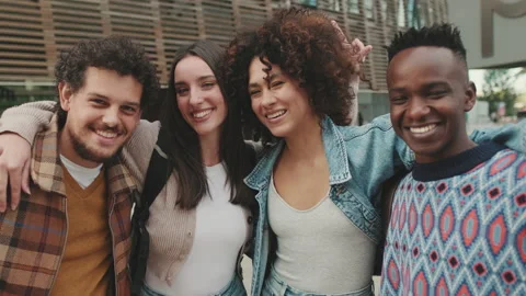 Close up, young smiling people posing while standing on the street Video stock 227385685