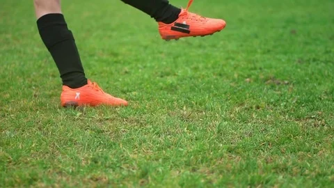 Close-up of young soccer player taking a penalty kick Stock Footage 80654628