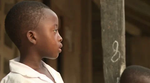 CLOSE UP: YOUNG STUDENT OUTSIDE CLASSROOMS Stock Footage 60625783