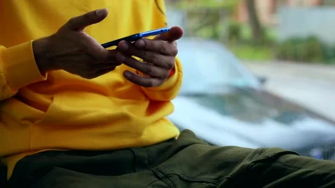 Close up of young stylish man hands using smartphone mobile in bus. Navigation 스톡 동영상 135520985