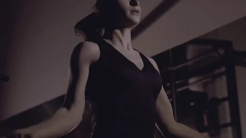 Close-up of young woman doing skip jumping. Stock-Footage 76908235