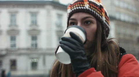 Close-up of young woman drinking take away coffee outdoors  Stock Footage 59949666