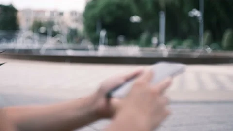 Close up of young woman hands using and holding smart phone, scrolling up and Stock Footage 199214221