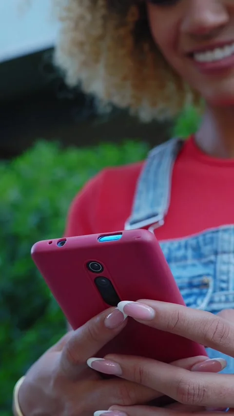 Close up young woman hands using mobile phone at city street. Stock Footage 309034627