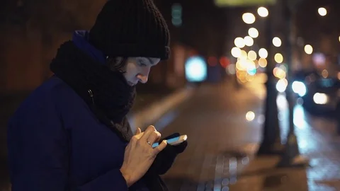 Close up of young woman using smartphone checking mails, chats or news online Stock Footage 83068459