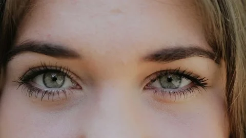 Close-Up of Young Woman’s Blinking Eyes, Slow Motion Macro Shot of Female Eyes Video stock 131045594