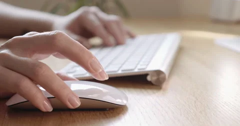 Close-Up Of Young Women Hands Using Bluetooth Mouse On Wooden Desk 4K Stock Footage 47451809