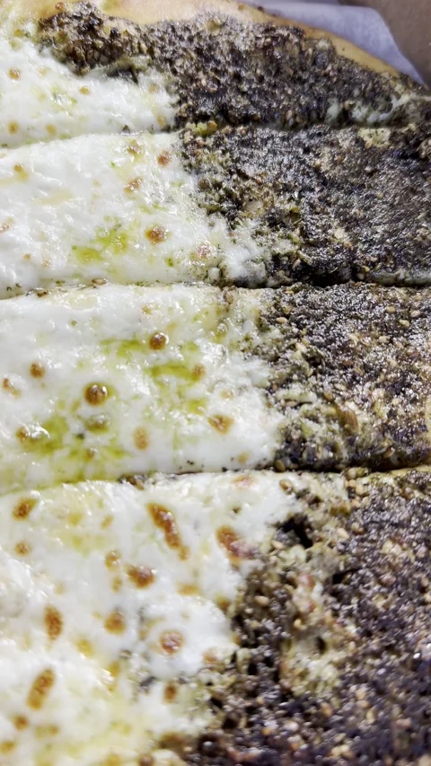 Close Up Zaatar and Cheese Flatbread Vídeos de archivo 344991221