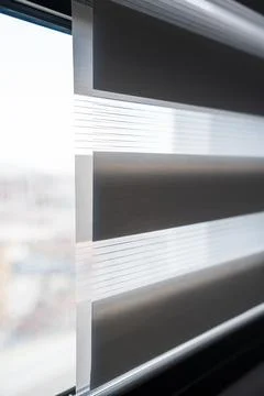 Close-up of zebra blinds texture with diffused daylight and modern minimal look 스톡 사진